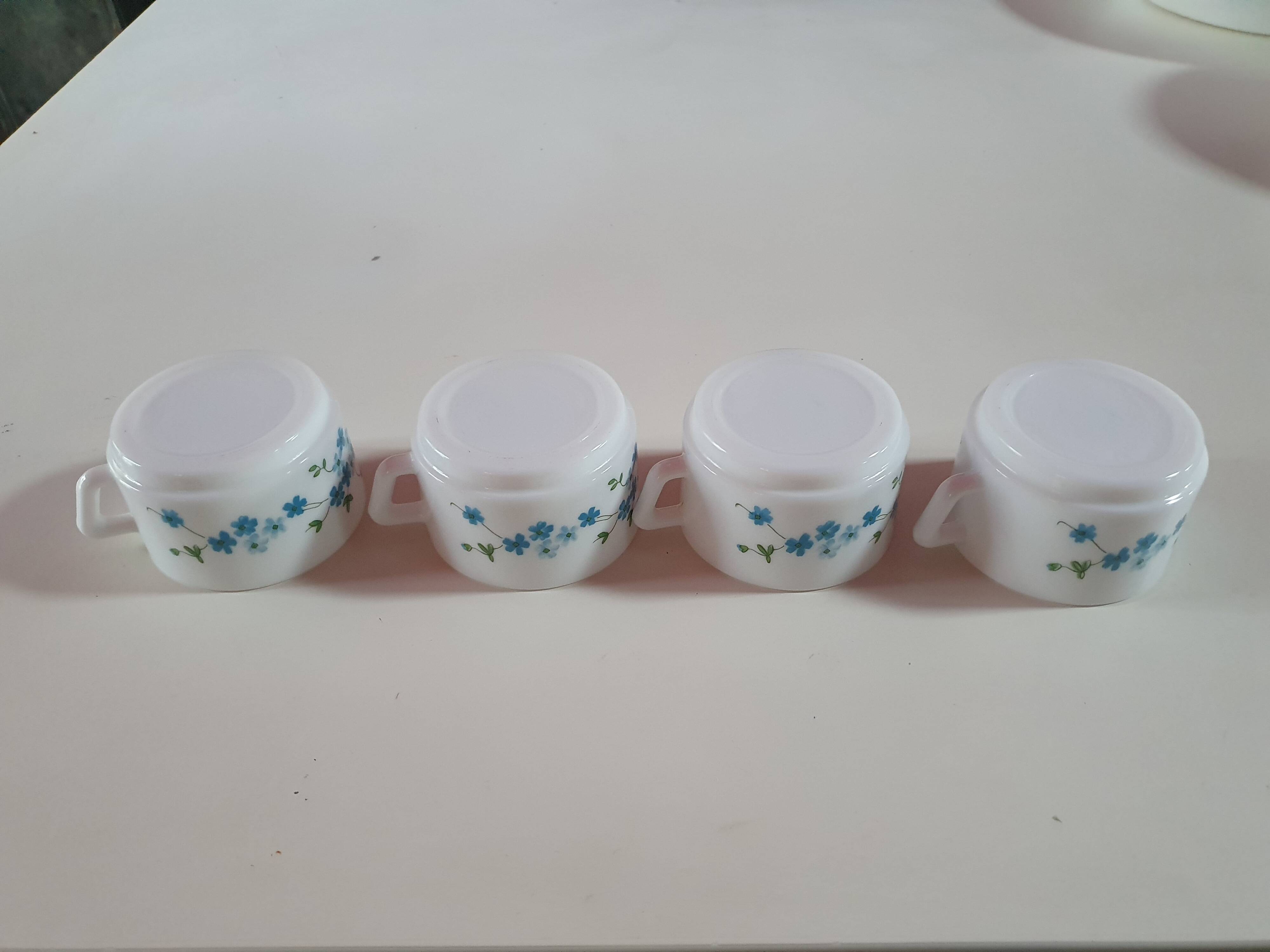 set of 4 vintage arcopal cups with small mysotis blue flowers