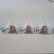 set of 4 vintage arcopal cups with small mysotis blue flowers
