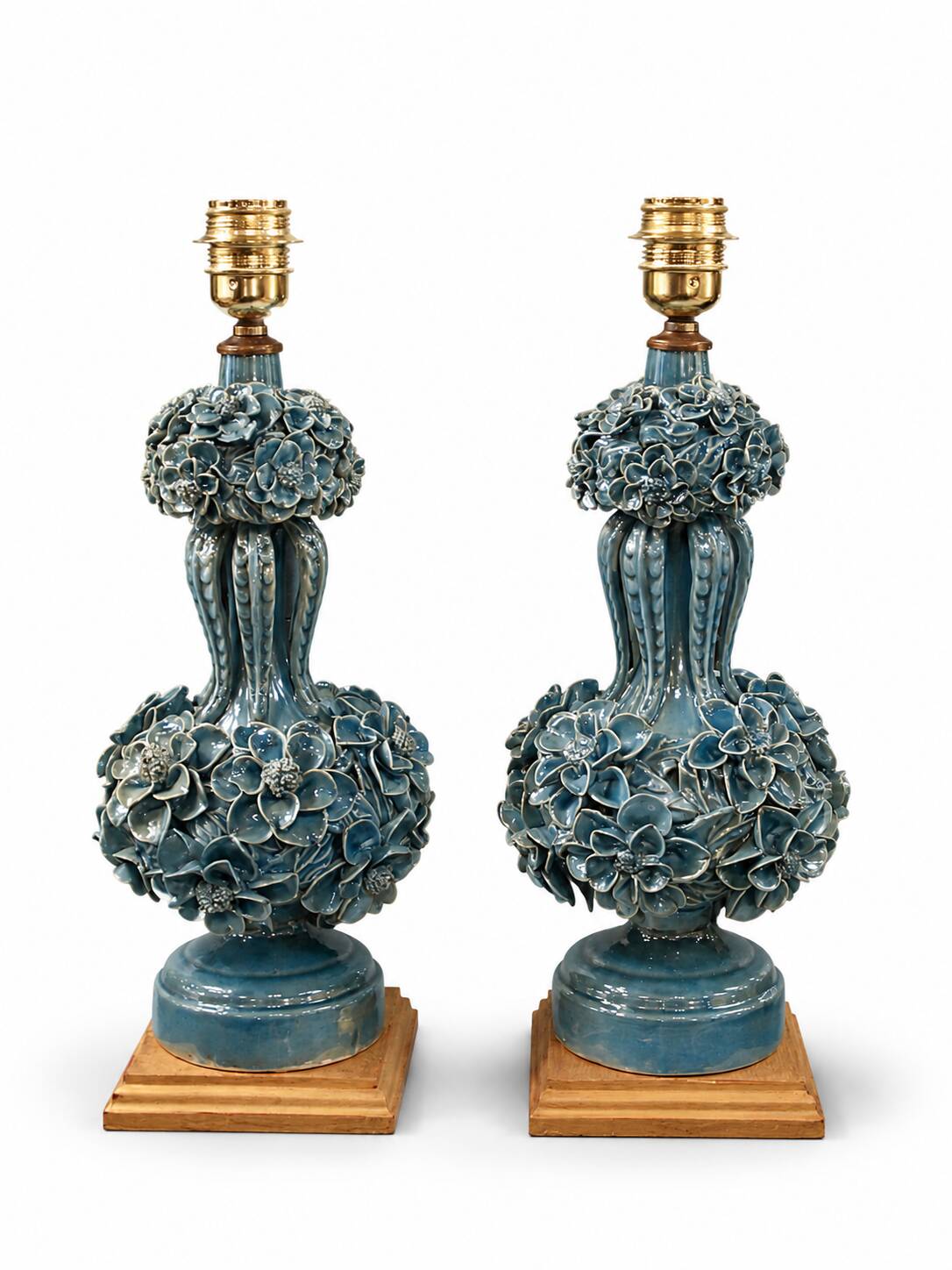 Pair of iridescent light blue lamps, featuring a floral bush design