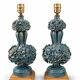 Pair of iridescent light blue lamps, featuring a floral bush design