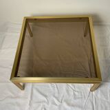 Table basse en verre et laiton