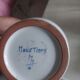 Moustier vase signed