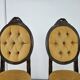 Pair of early 1900s wooden chairs with padded seat and backrests