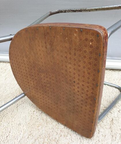 Modernist office chair seated pyroengraved cannage