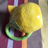 Lemon yellow ceramic pitcher