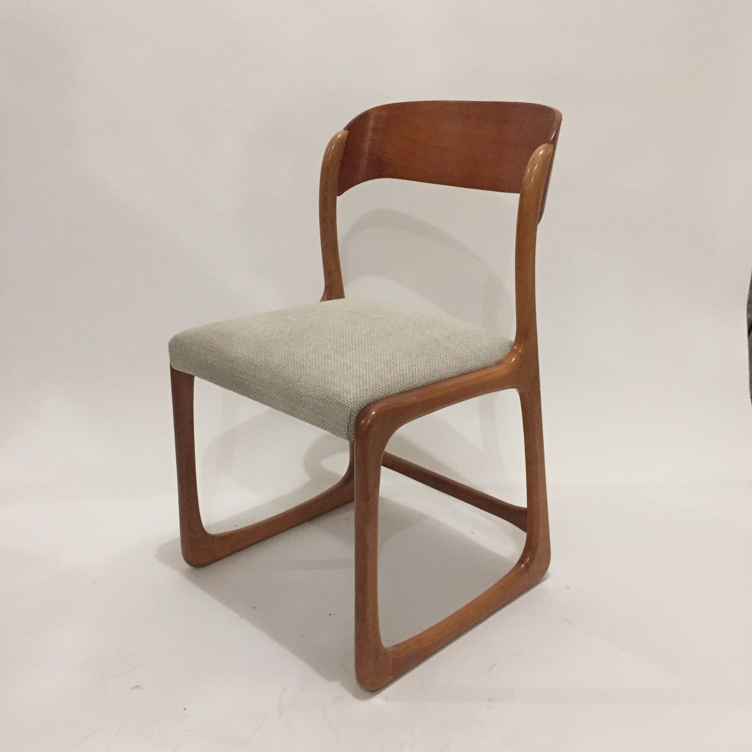 Series of 4 reupholstered Baumann sled chairs