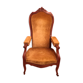 Fauteuil Voltaire en velours couleur moutarde