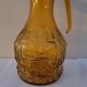 Amber relief glass pitcher. 1970s