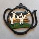 Vintage cast iron tablemat