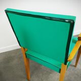Pair of wood and vinyl armchairs