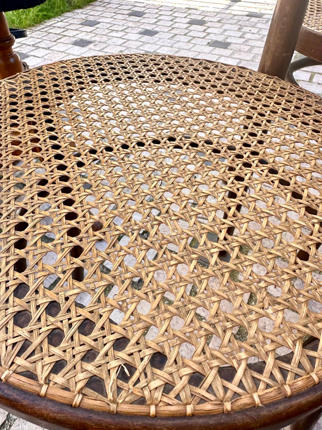 Wooden and cane bistro chairs