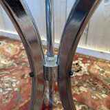 Contemporary glass and chrome dining table.