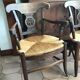 Paire de fauteuils paillés