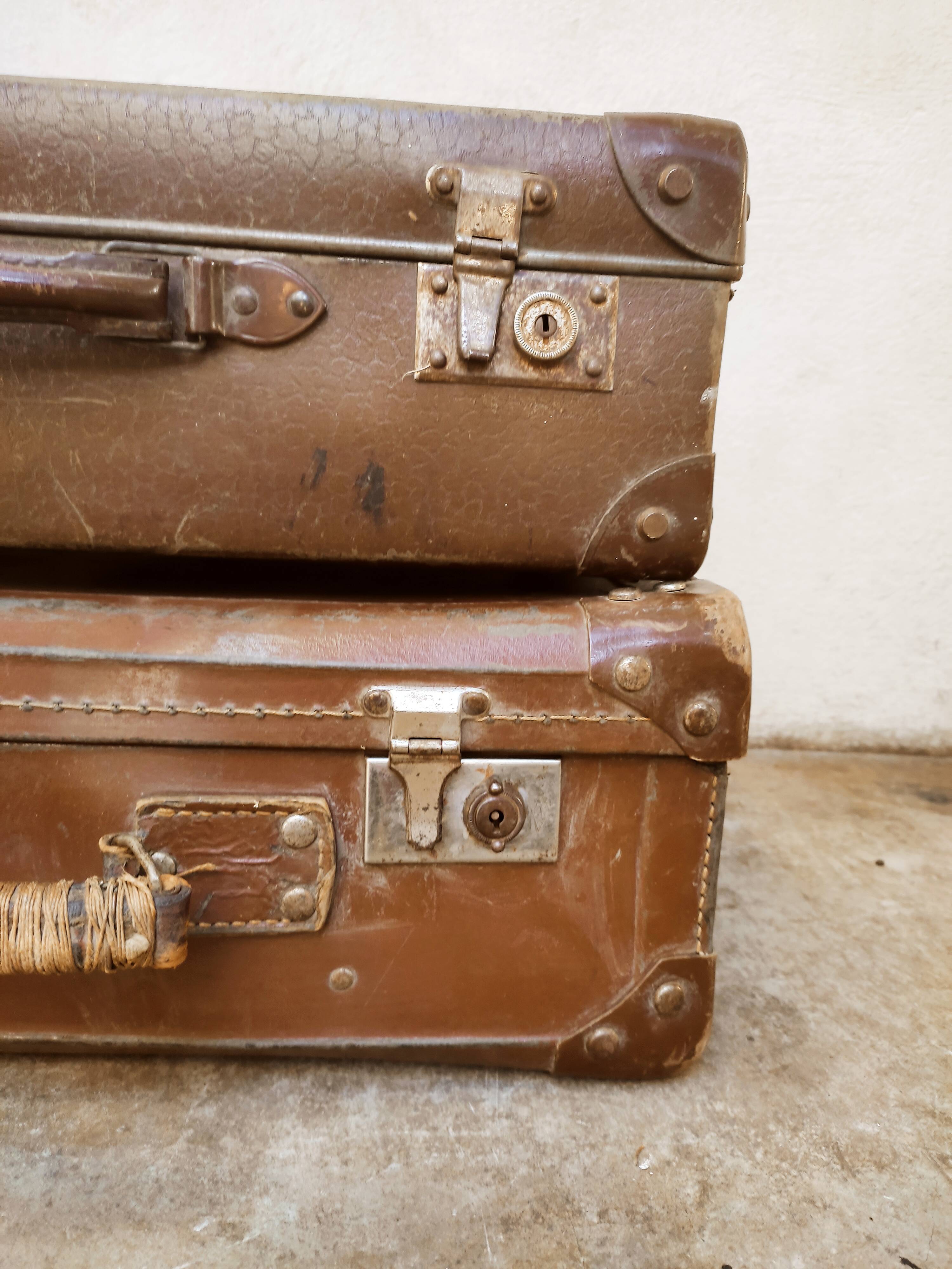 Duo of old suitcases