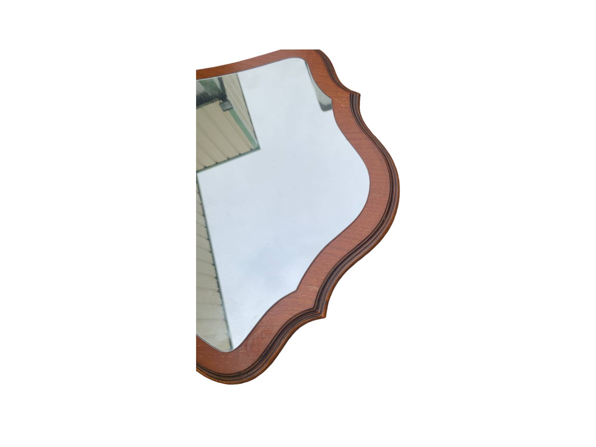 Beautiful wooden mirror with original shape