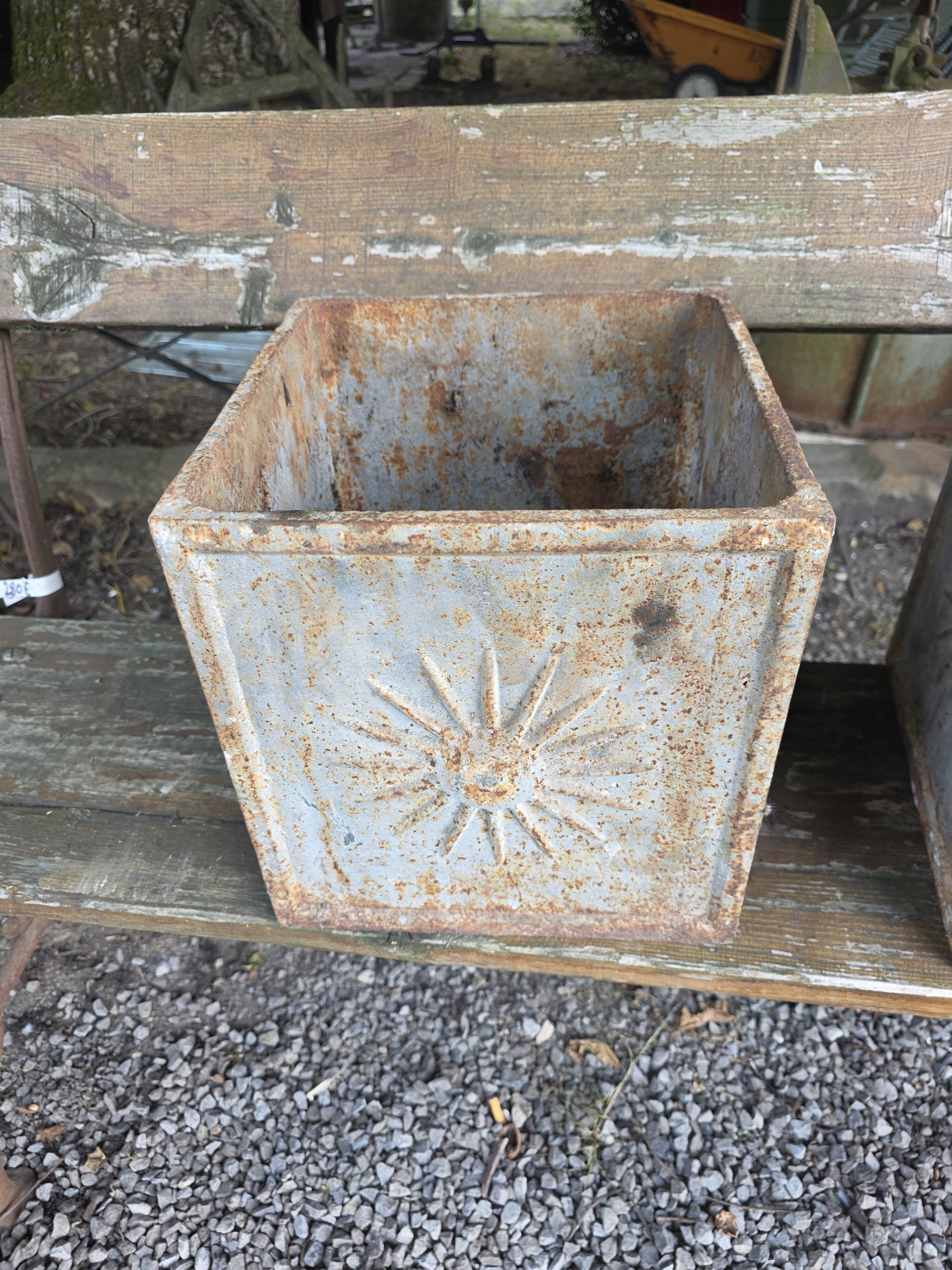 Pair of cast iron planters