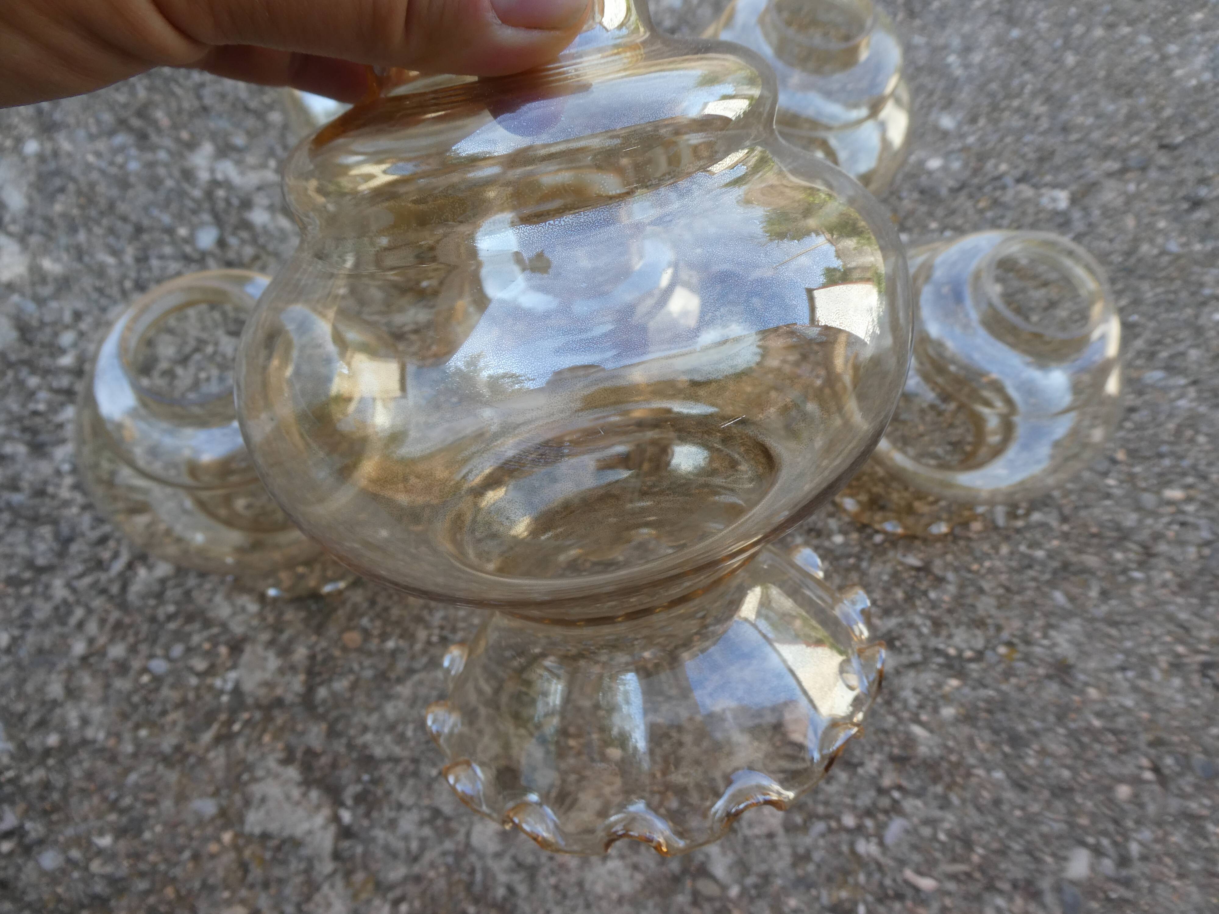 Set of 6 amber glass globes.