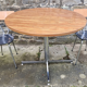 Round table Formica imitation wood and its two chairs