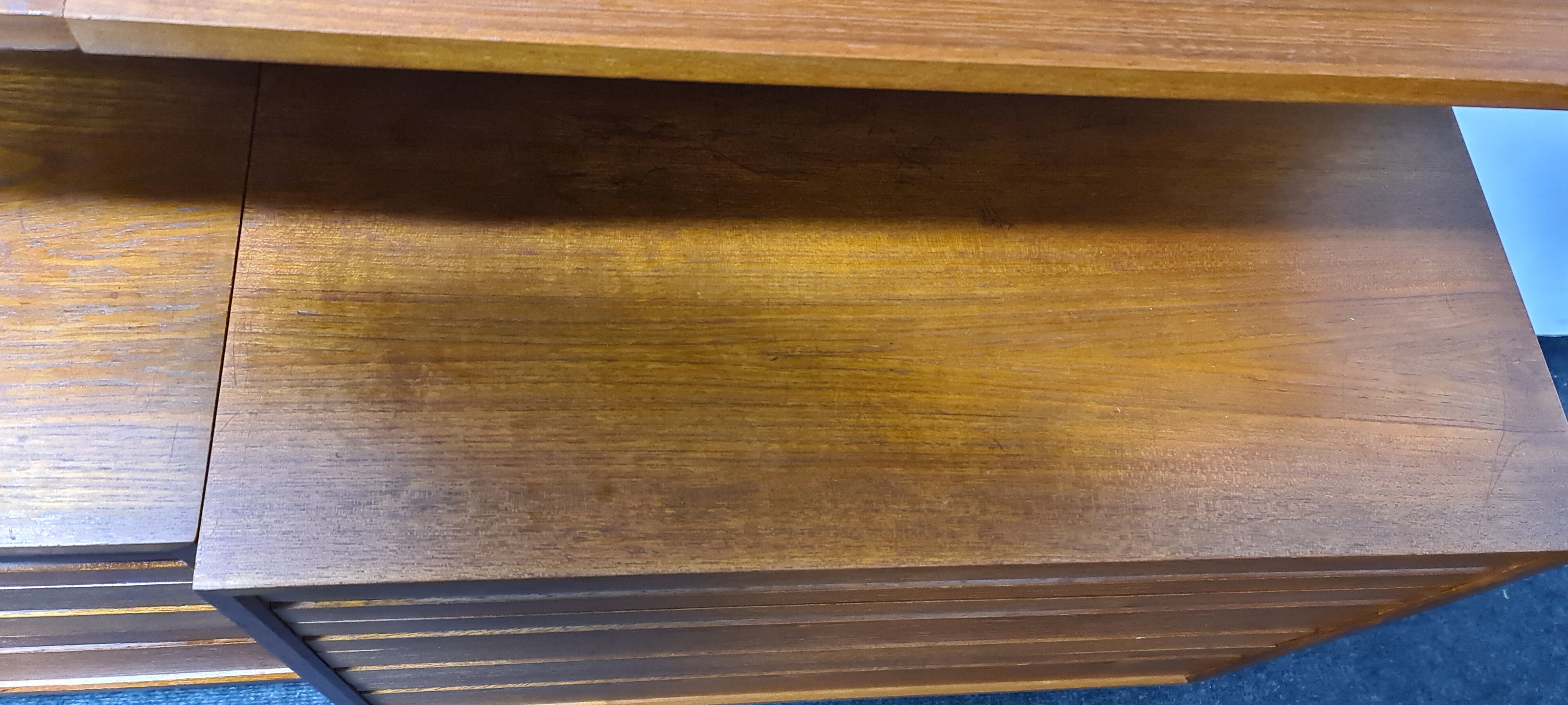 Teak wall unit by Poul Cadovious