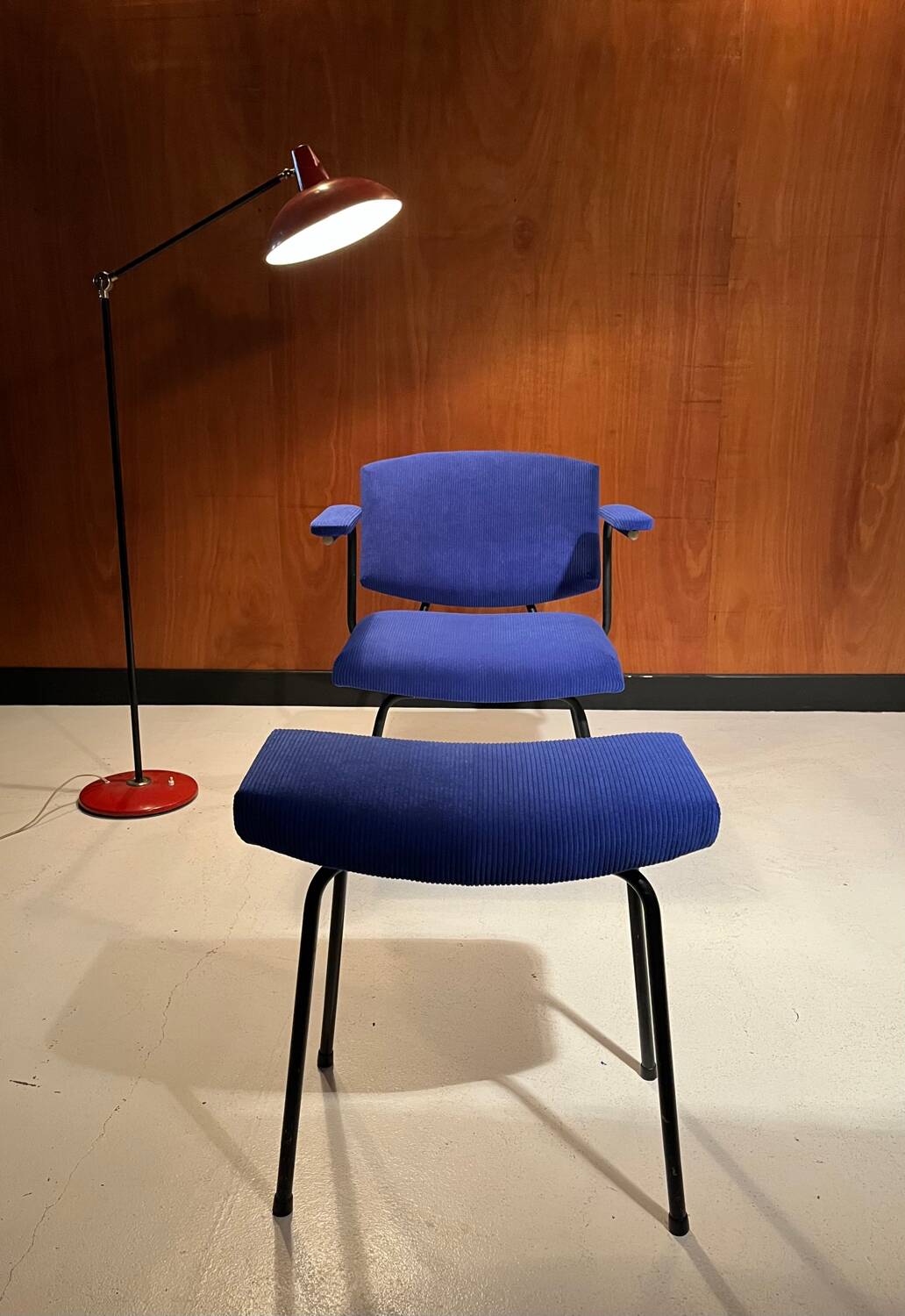 Vintage armchair and its footrest from around 1950.