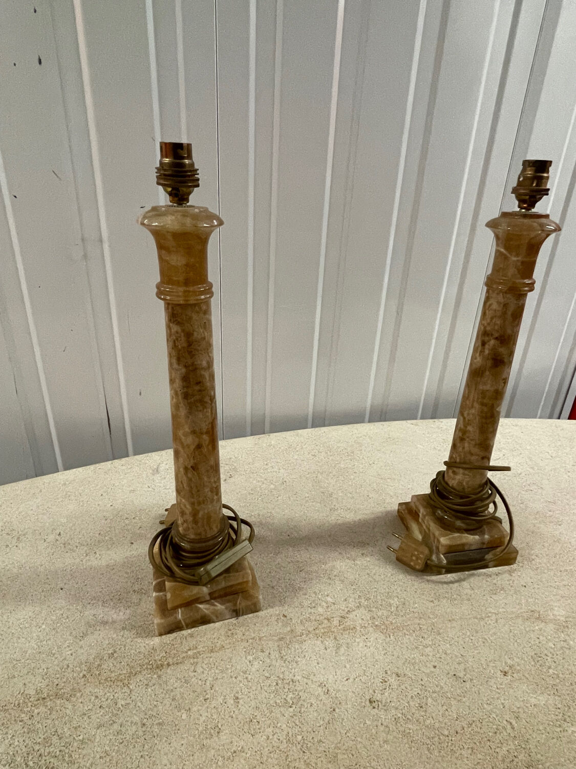 Pair of candlesticks in yellow sienna marble