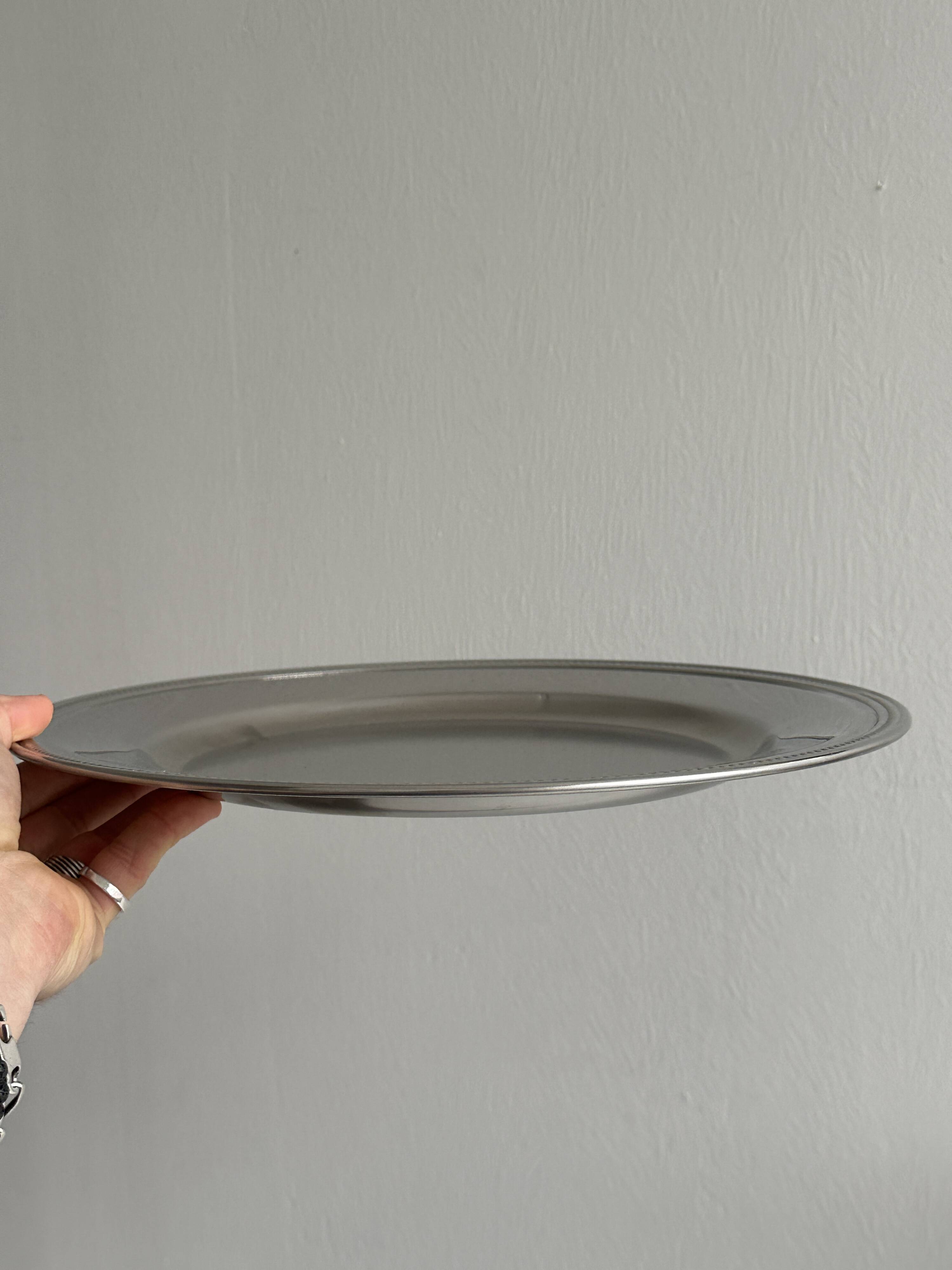 Large shiny stainless steel tray