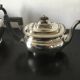 Set of teapots and milk jug.
