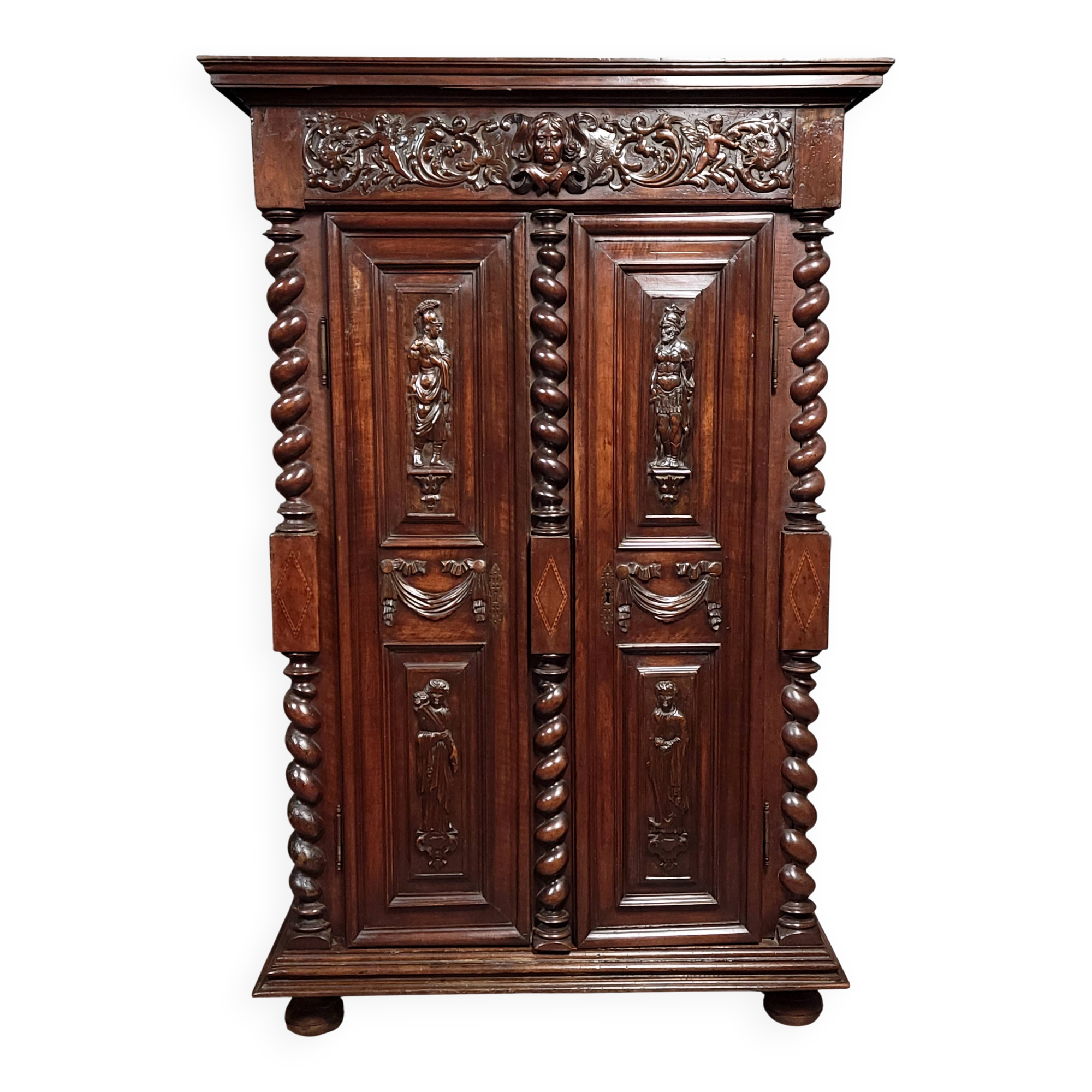 Renaissance style wardrobe in richly carved solid wood, 17th century