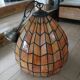 Antique stained glass and bronze pendant light