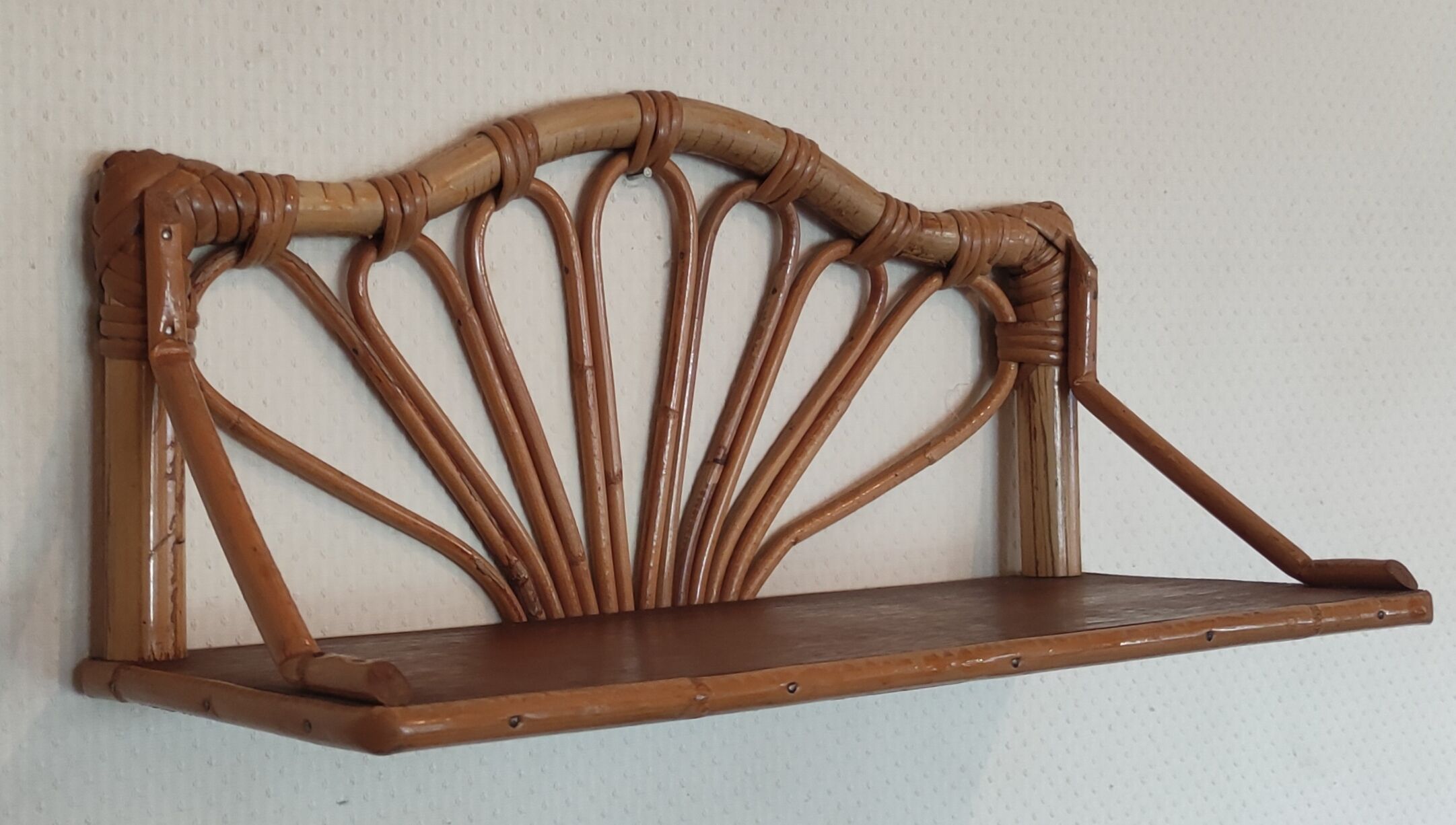 Rattan wall shelf