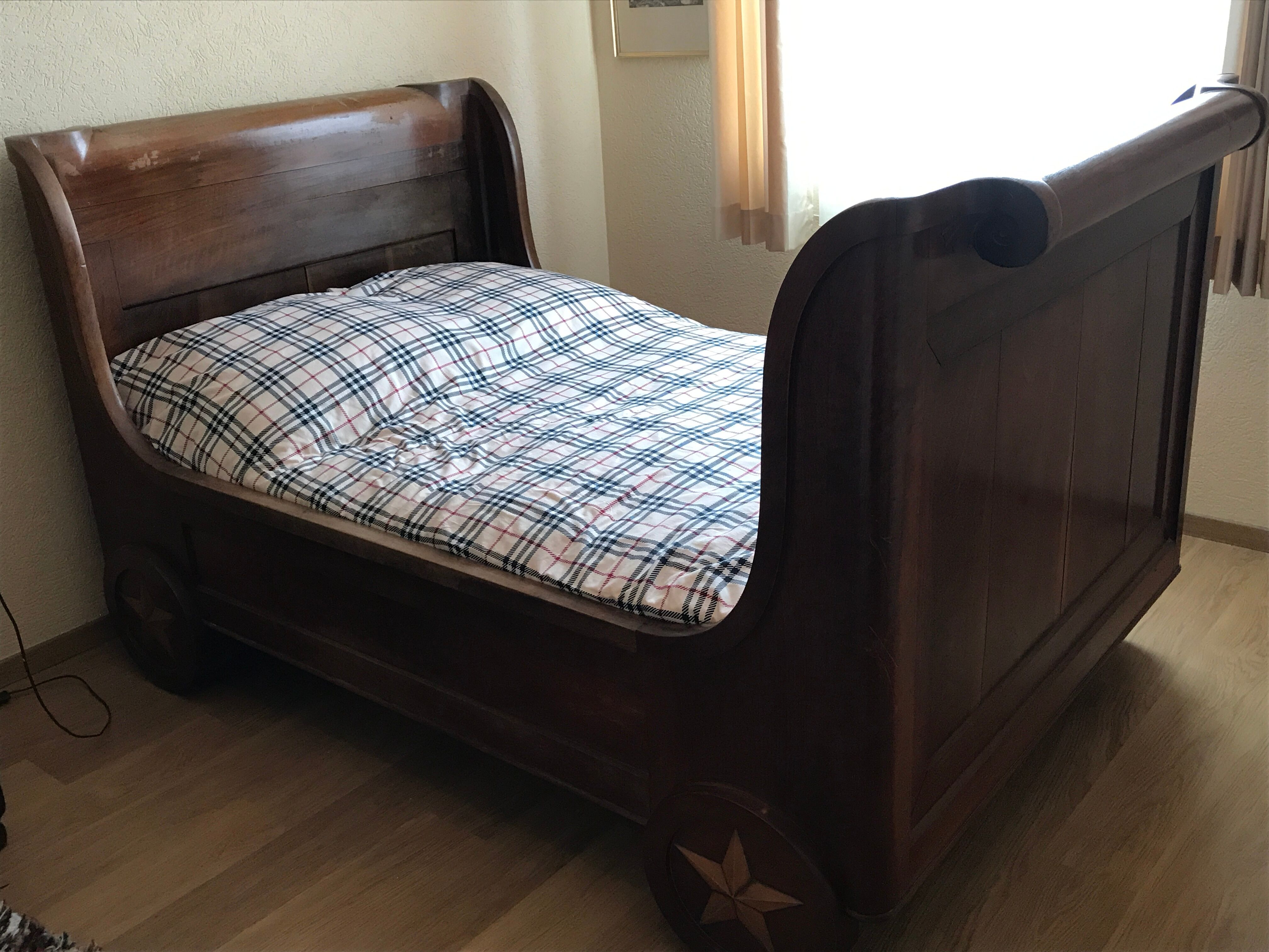 Old solid mahogany boat bed