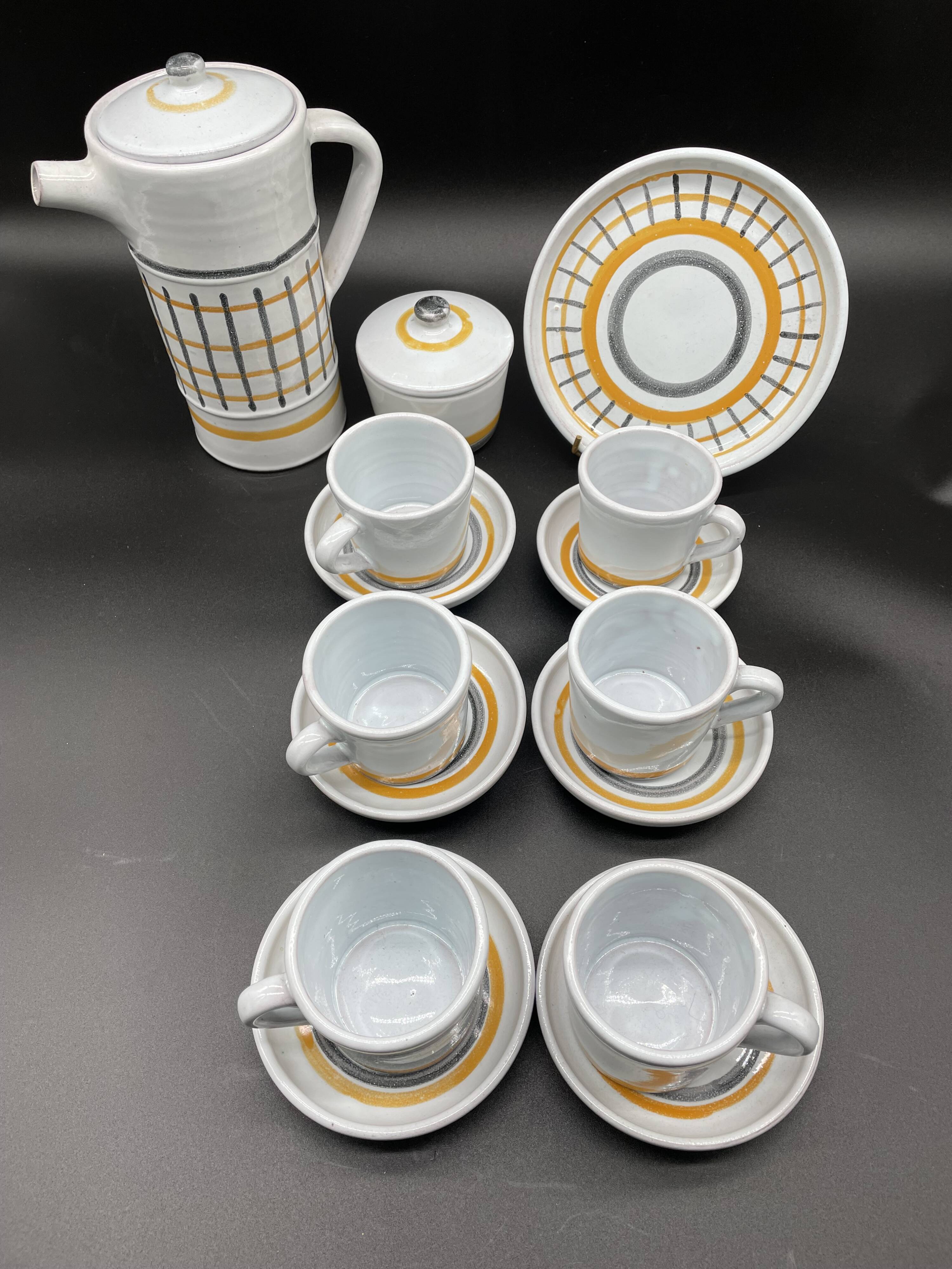 Vintage 1960s coffee service in ceramic, modernist design.