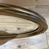 Miroir ovale doré