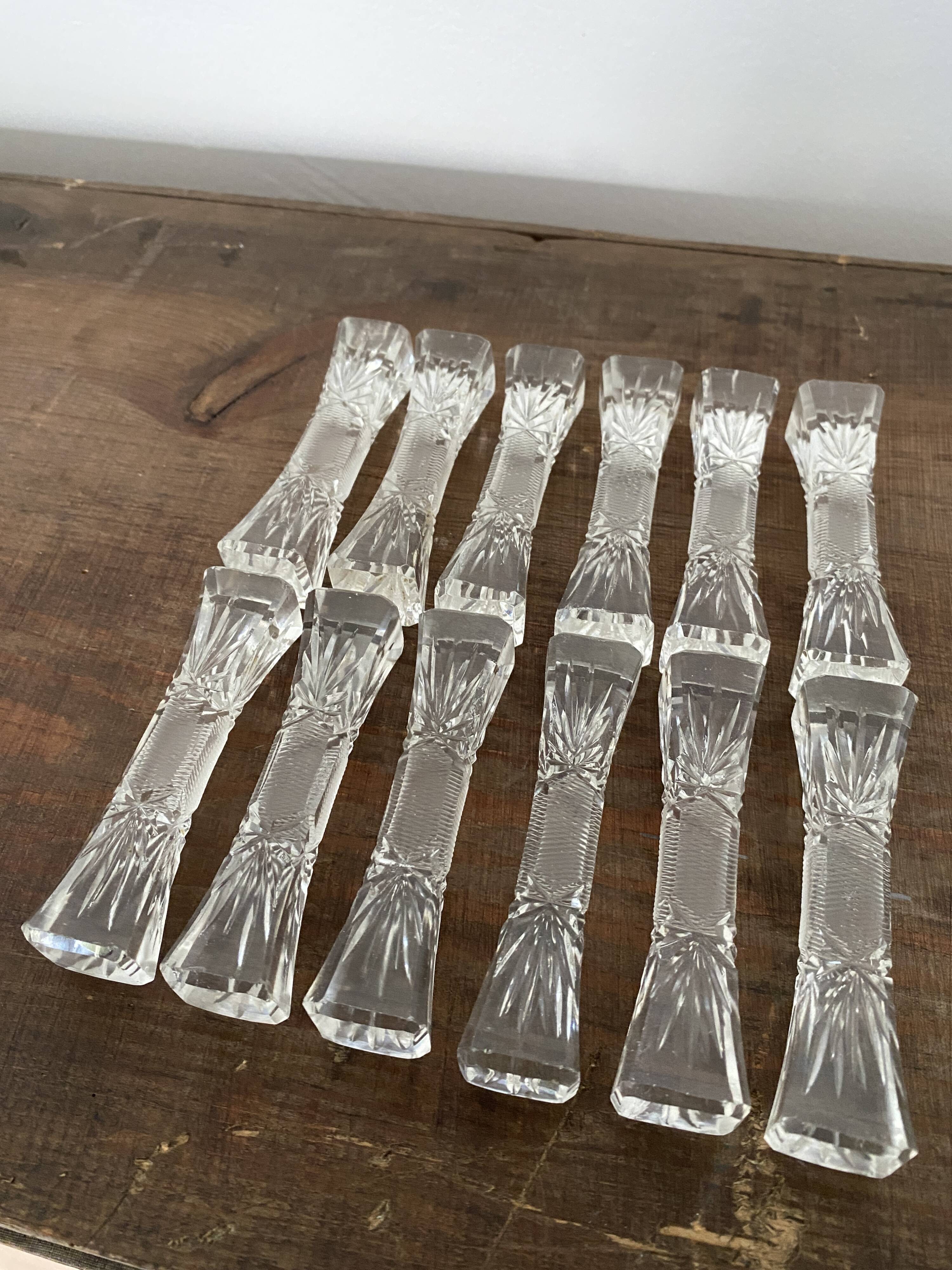 12 vintage knife holders in cut crystal, "candy", "butterfly" shape