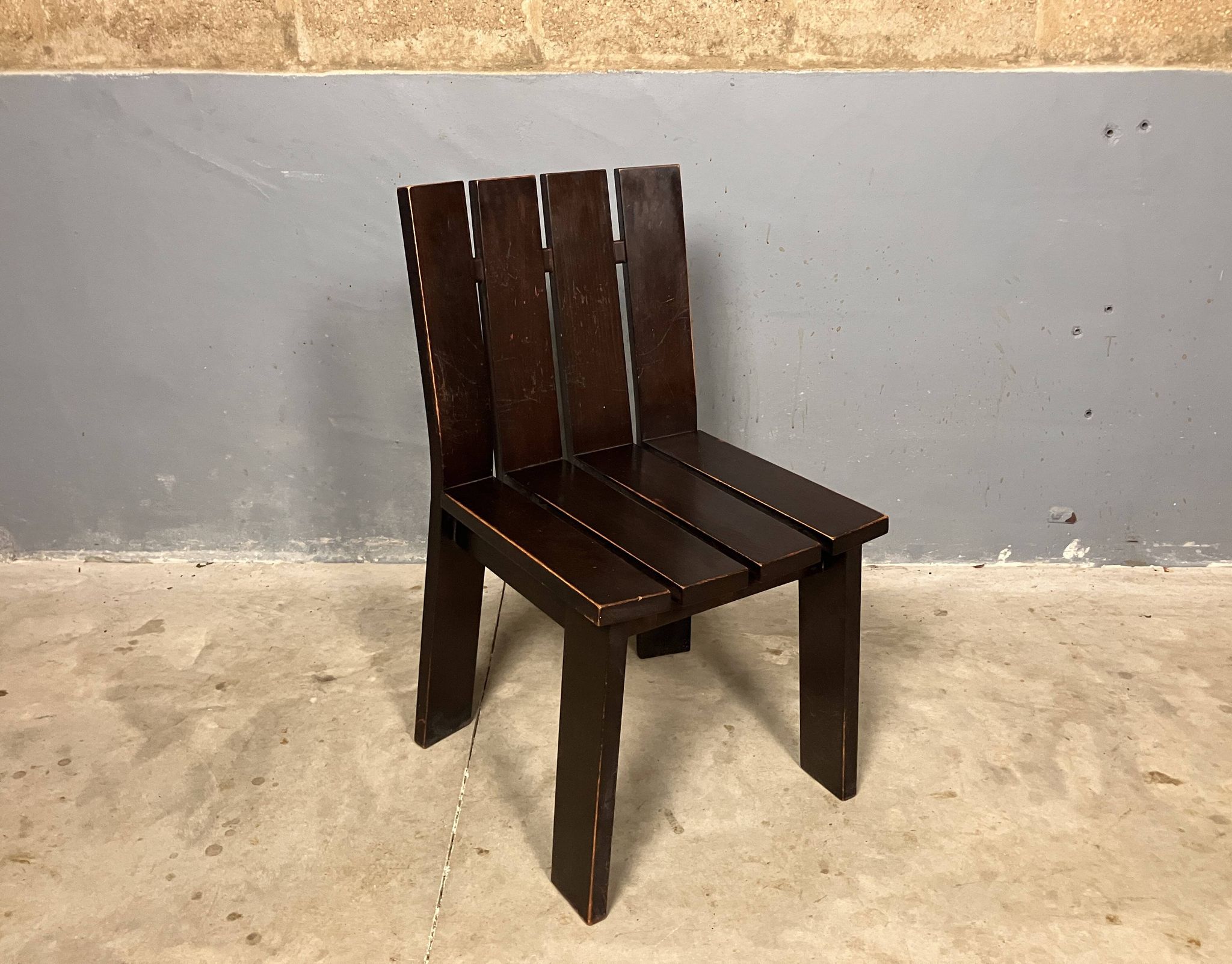 Brutalist and modernist dining chairs from the 1970s in architectural brown wood.
