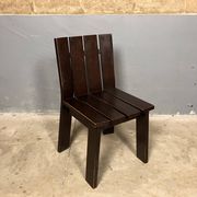 Brutalist and modernist dining chairs from the 1970s in architectural brown wood.
