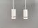 Two small cylindrical hanging lamps in white powder-coated 1980s