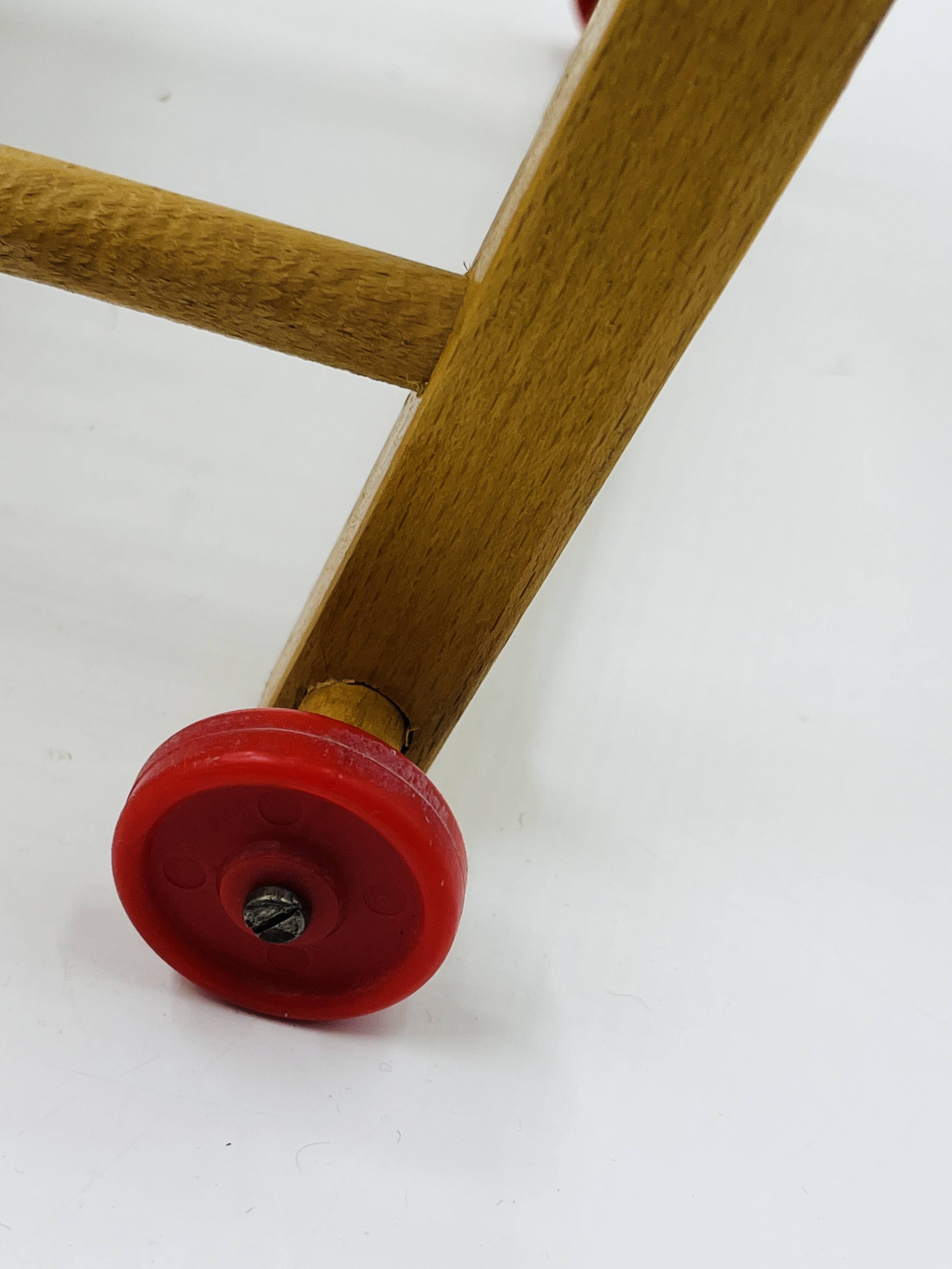 Vintage wooden doll high chair convertible into a walker