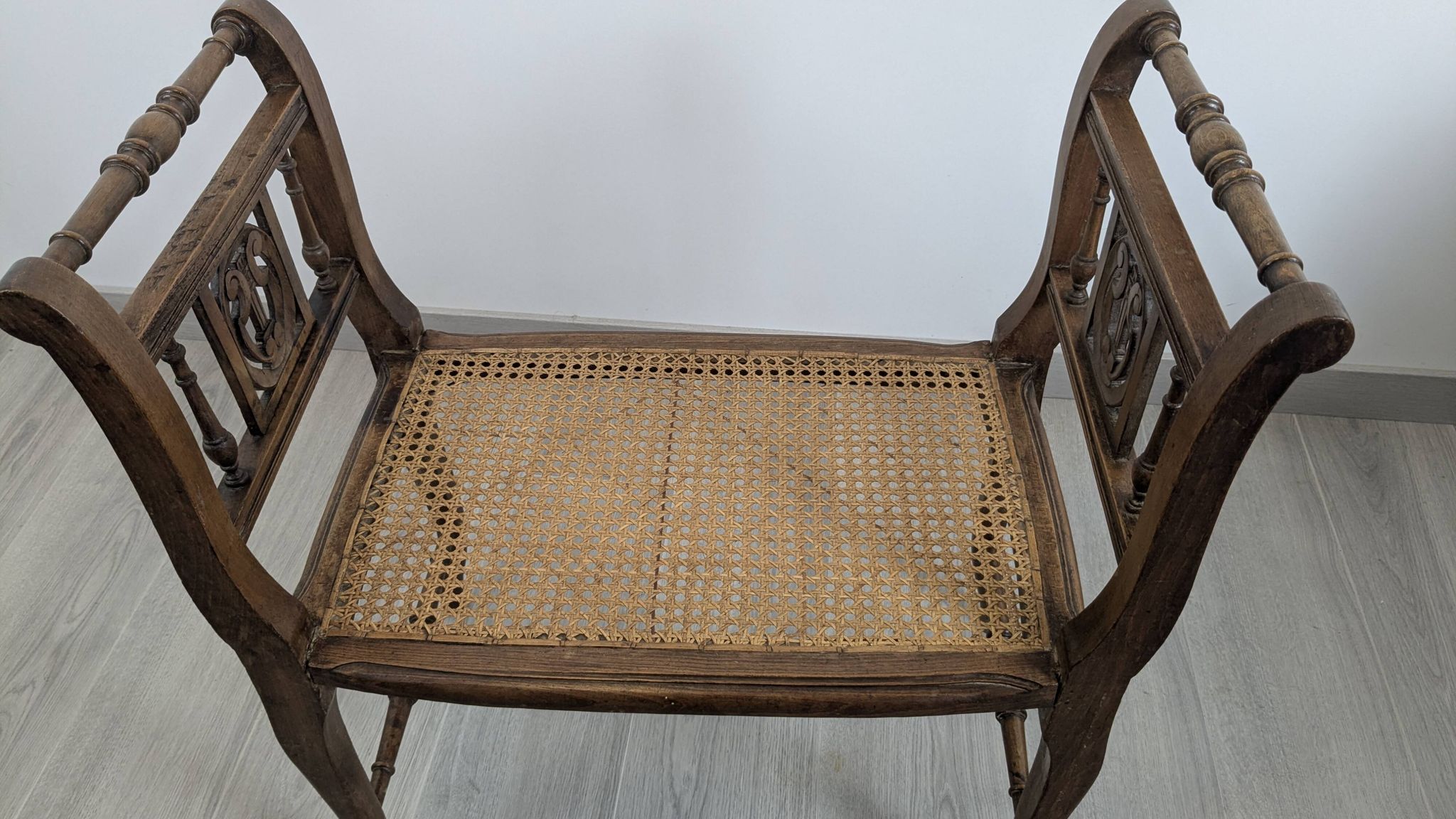 Napoleon III caned piano bench — bourgeois house spirit