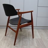 Vintage armchair in teak and black leather model Casina 60s