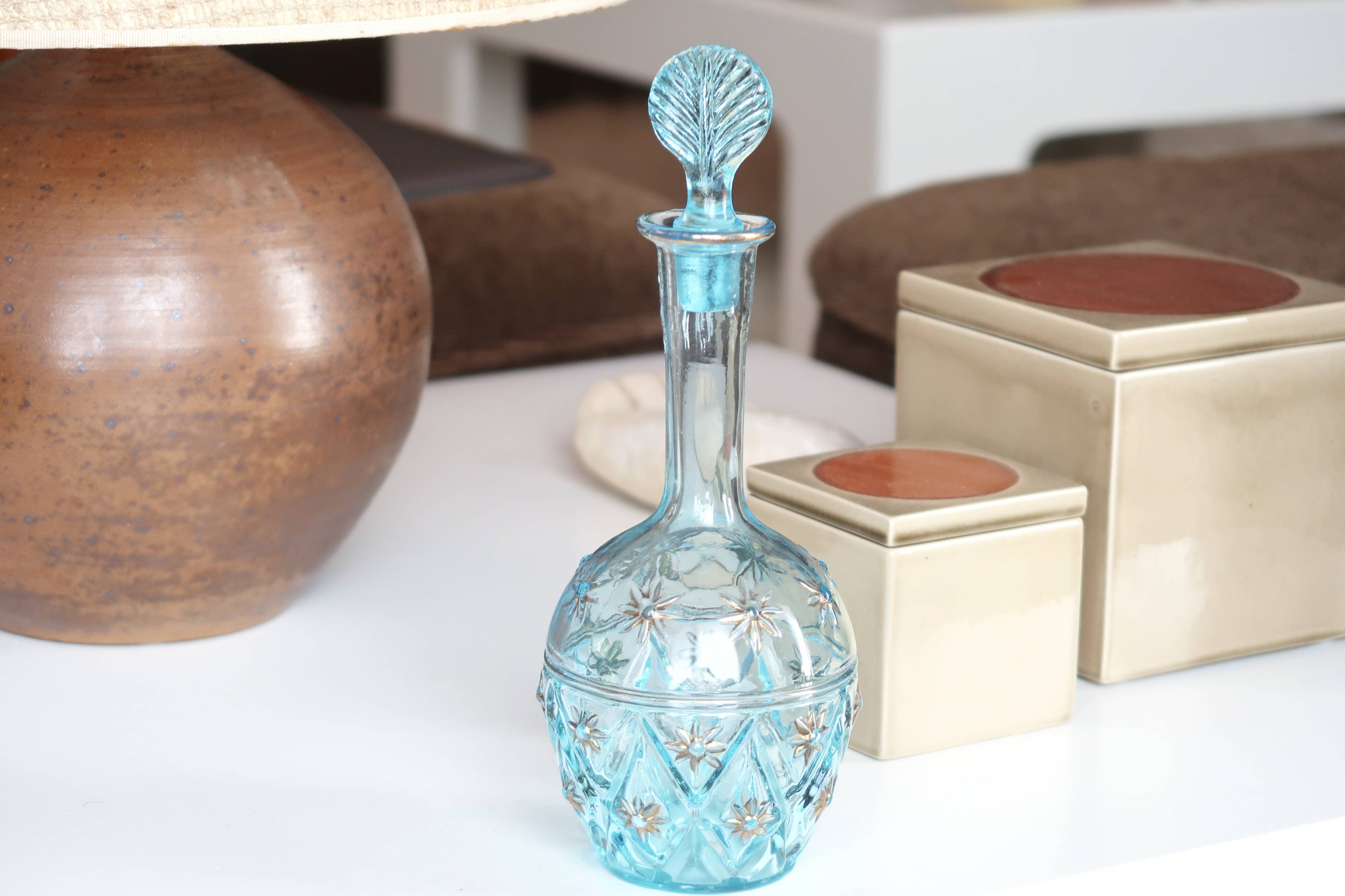 Turquoise blue glass decanter, golden décor, 5O years