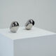 Ensemble de deux lampes de table Reggiani en chrome.