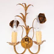 Vintage wall light in gold metal with flower and leaf decoration