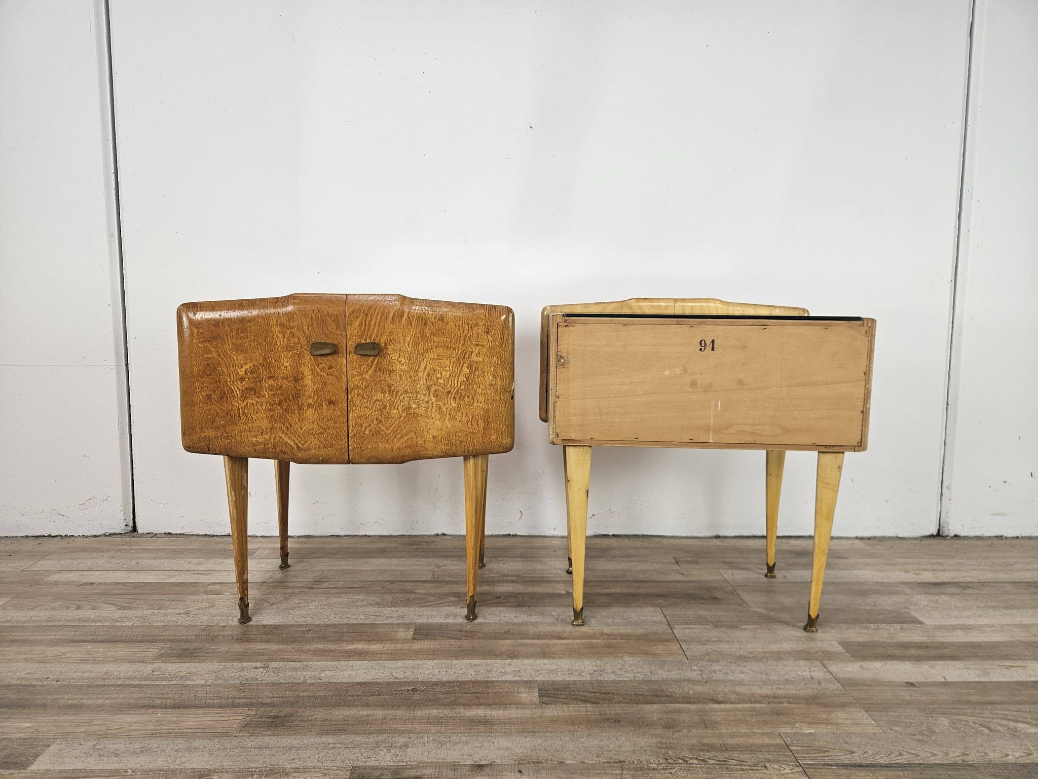 Pair of maple bedside tables from the 1950s with mirrored tops.