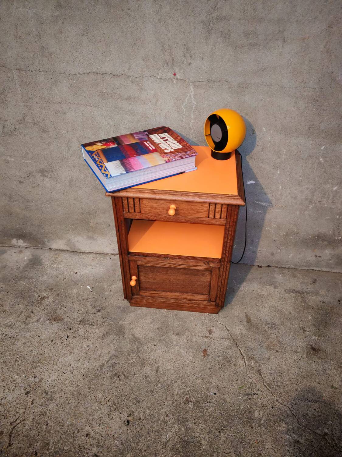 Art Deco orange bedside table