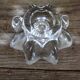 A vintage star flower glass candlestick.