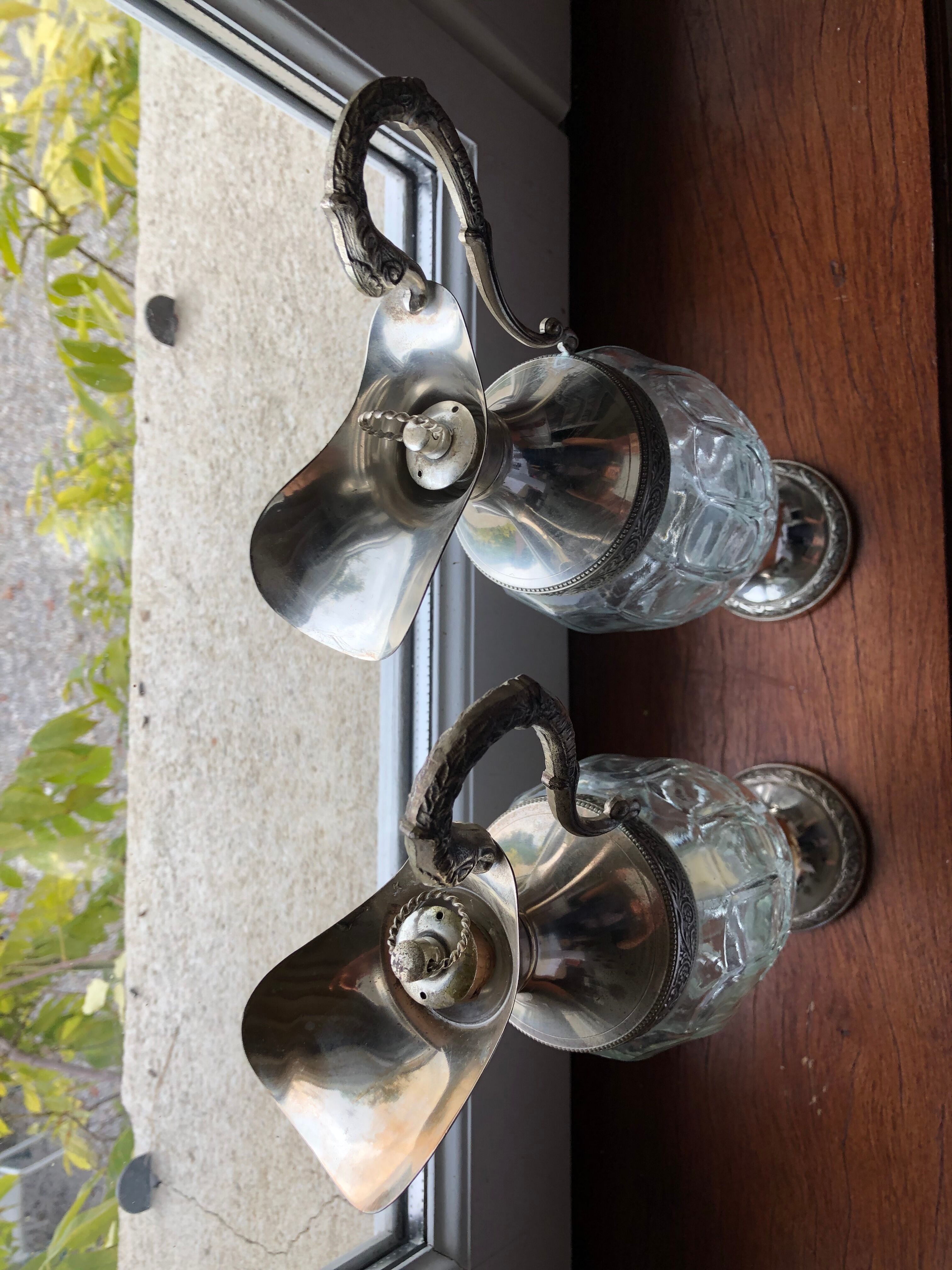 Pair of glass and silver metal ewers