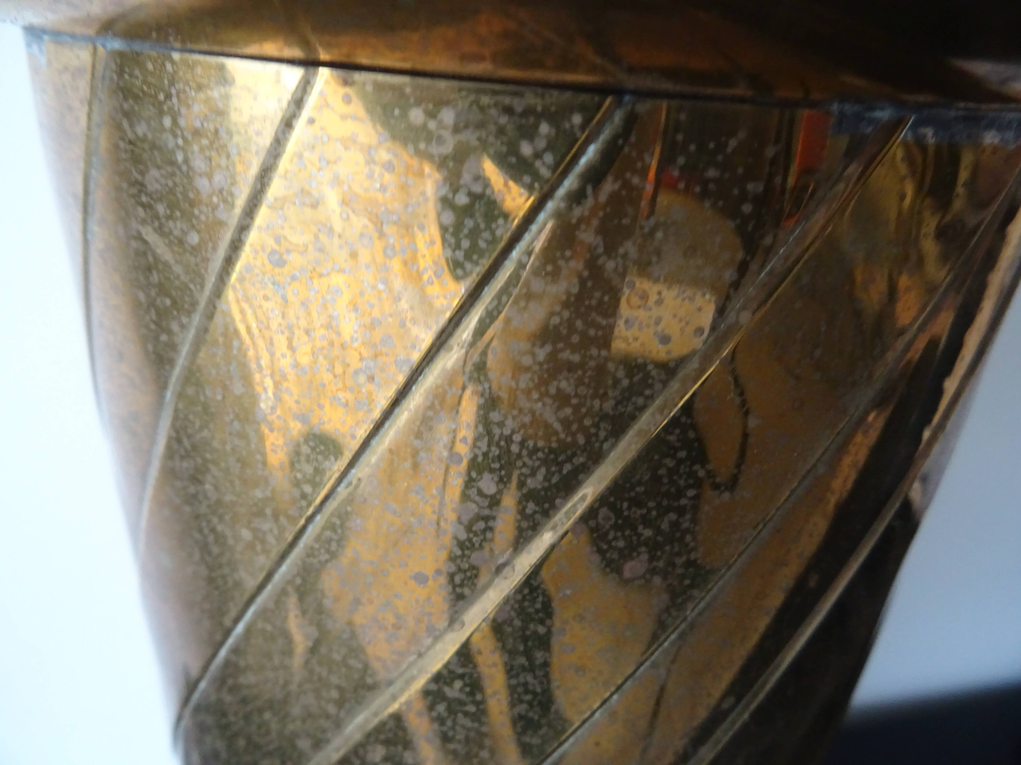 Pedestal column in vintage gilded metal