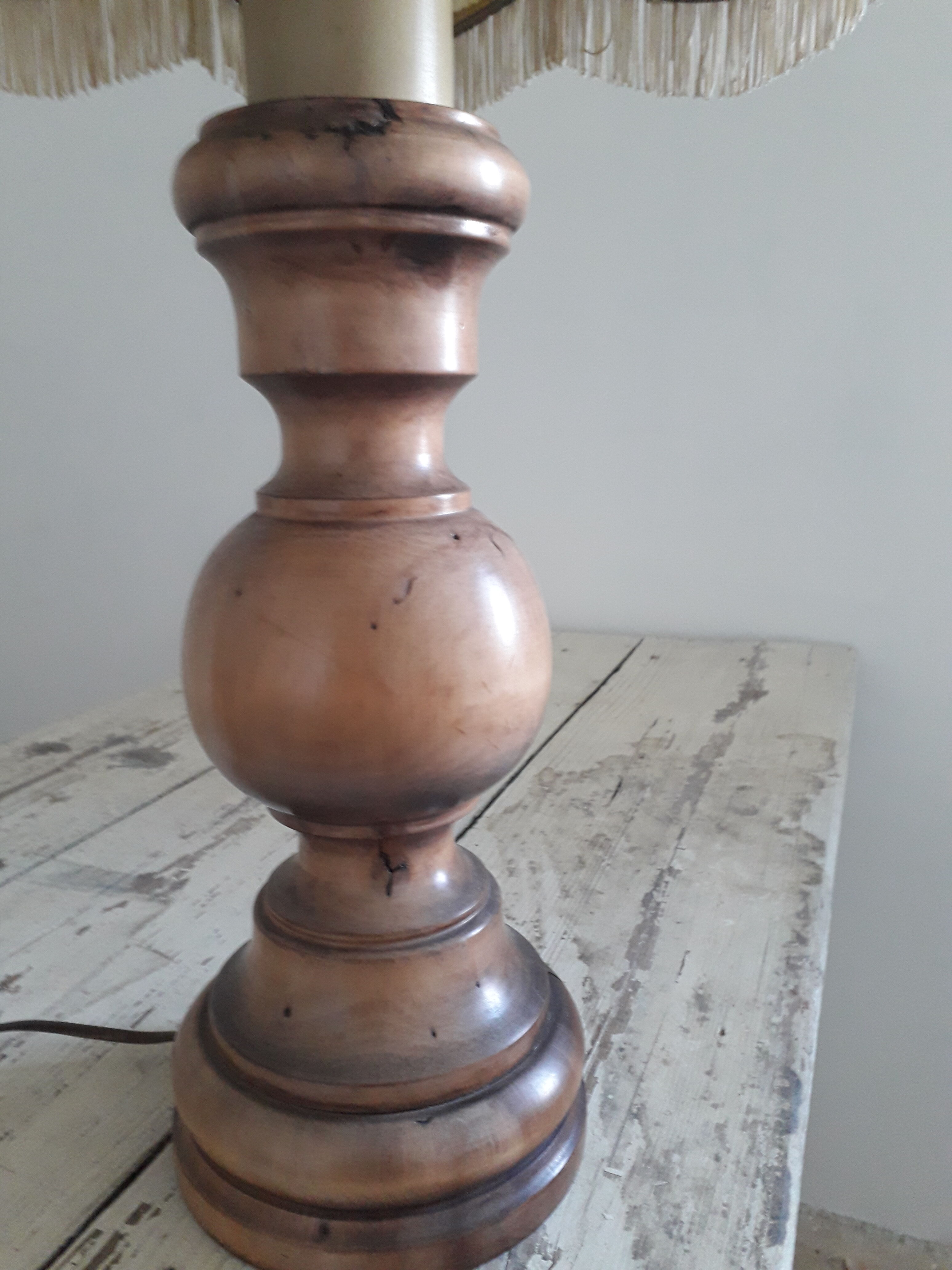 Turned wood table lamp with “skin” shade