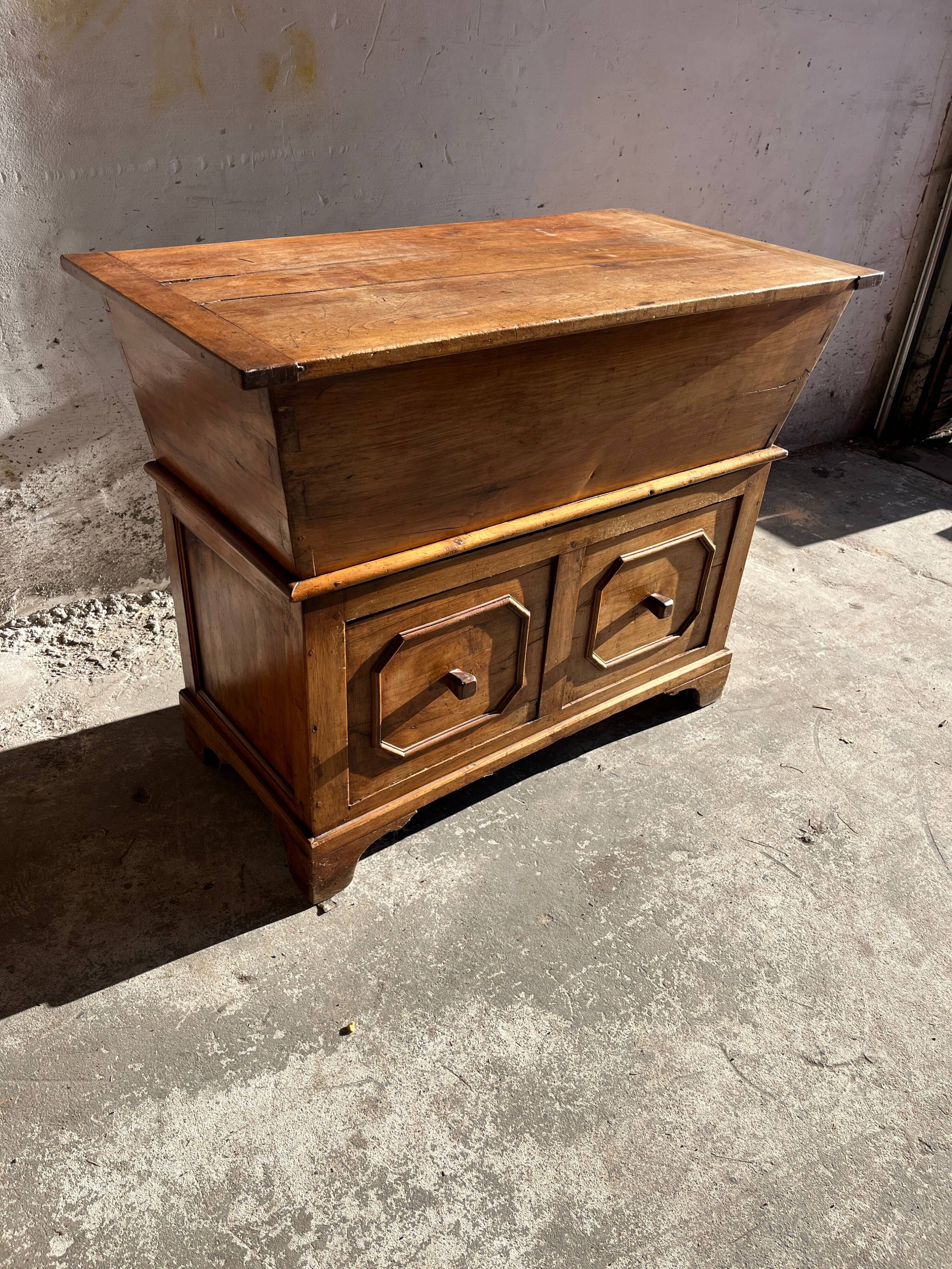 Old wooden baker's chest with storage drawers